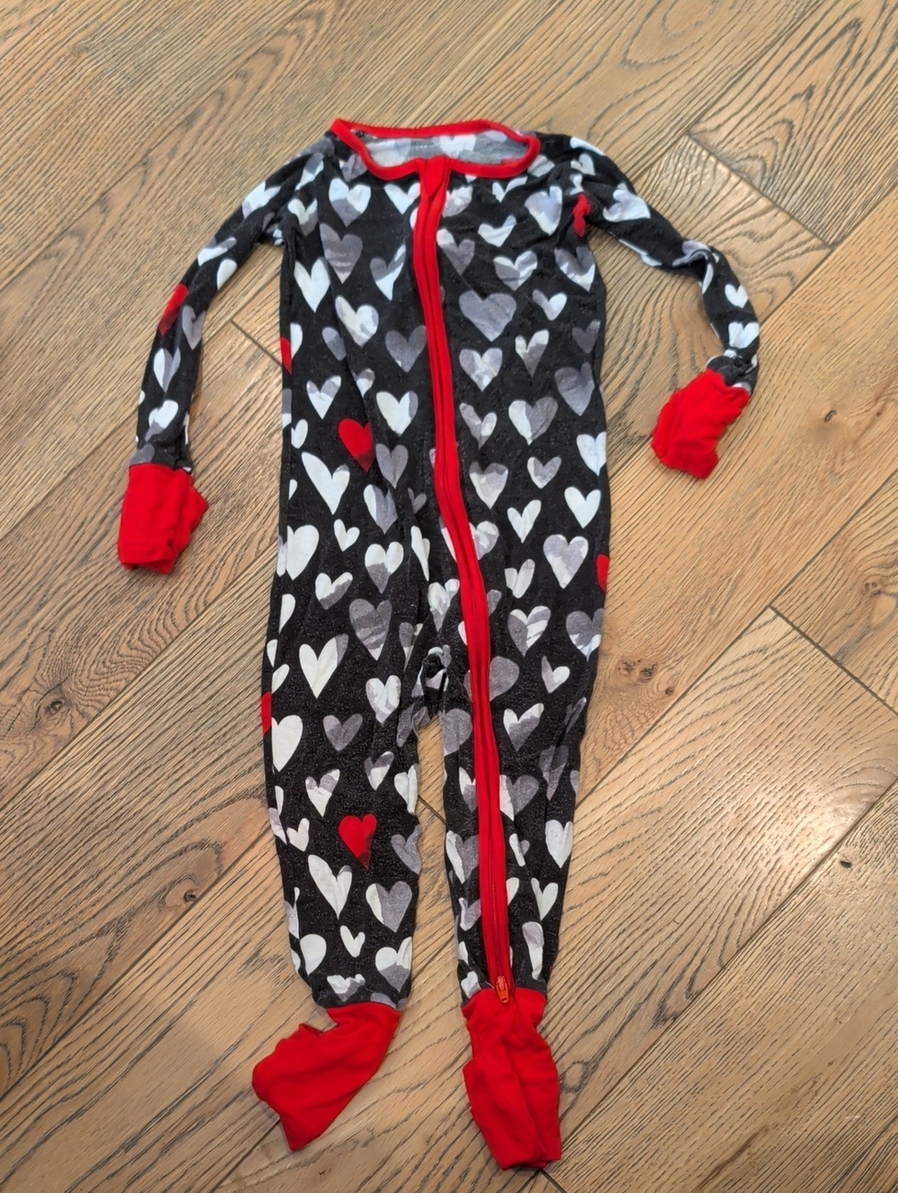 Little Sleepies Black Heart-Print Footed Pajamas with Red Trim